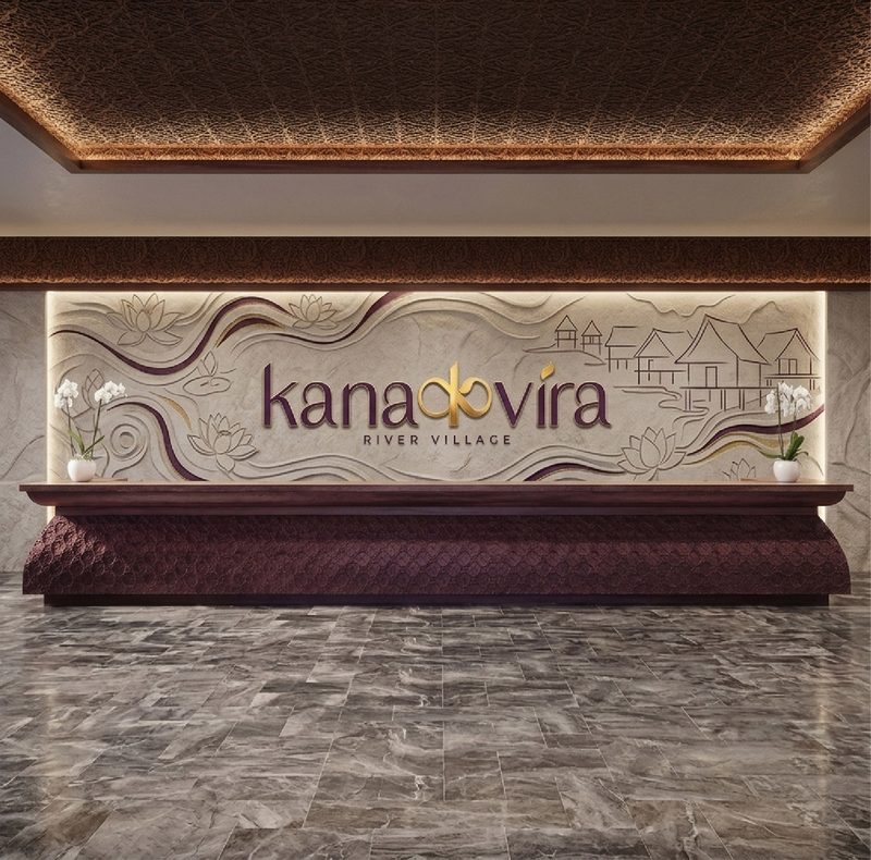 Kanakvira logo on a resort reception wall